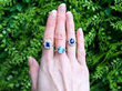 wearing gemstone rings outside