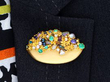 Multi Gemstone Gold Brooch wearing