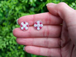 Floral Ruby and Diamond Stud Earrings outside