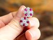 Floral Ruby and Diamond Stud Earrings in white gold