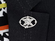 wearing Edwardian Floral Diamond Brooch in Platinum