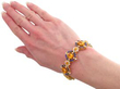 wearing Yellow and Blue Sapphire Bracelet in Gold