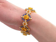 Yellow and Blue Sapphire Bracelet in Gold being worn