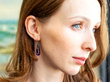 Antique Amethyst Drop Earring in ear