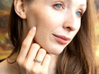 Bezel Set Five Stone Ring in Gold being Worn