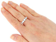 Bezel Set Five Stone Ring in Yellow Gold on hand