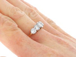gold bezel set ring on finger