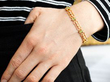 wearing Antique Garnet and Pearl Bracelet in yellow Gold