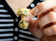 Vintage Cat Brooch with Emeralds in yellow gold