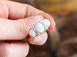 Victorian opal ring in gold being held