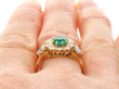 Vintage Emerald and Diamond Cluster Ring in Gold on finger