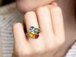 Green Orange and Blue Sapphire Ring in Gold on hand