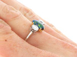 Antique Black Opal and Diamond Trilogy Ring on hand