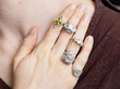 gemstone rings on hand