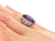 Antique 1920s Oval Amethyst Ring in Platinum being worn