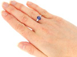 wearing Oval Sapphire Ring with Diamond Shoulders