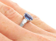Oval Sapphire Ring with Diamond Shoulders being worn