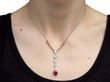 wearing Pear Cut Ruby Pendant Necklace