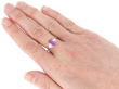 wearing Pink Sapphire Engagement Ring with Baguette Diamonds