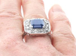 Octagon Blue Sapphire Ring with Diamonds on finger