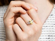 wearing 3.9 Carat Oval Yellow Sapphire Engagement Ring