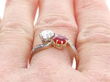 wearing a ruby and diamond bypass ring