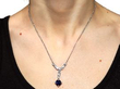 wearing Art Deco Sapphire Pendant in Platinum