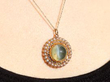 Yellow Gold Cat's Eye Chrysoberyl Pendant with pears and diamonds wearing