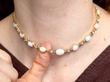 wearing Victorian Opal Diamond yellow gold necklace