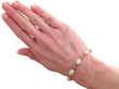 Opal Diamond yellow gold bracelet on wrist