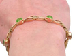 Art Nouveau Peridot Bracelet in Gold on wrist