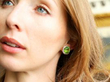 Vintage Peridot earring in ear