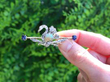 Victorian Gemstone Swan Brooch in Gold outside