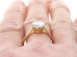 1.5 Carat Solitaire Diamond Ring in Yellow Gold on finger