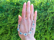 Diamond and Aquamarine Necklace in White Gold outside