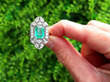 1920s Colombian Emerald Dress Ring in Platinum outside