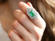 wearing 1920s Colombian Emerald Dress Ring in Platinum