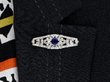 wearing 1920s sapphire and Diamond Brooch in Platinum