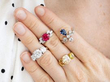 gemstone rings on hand