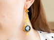 22k Gold Cameo Earring being worn