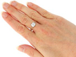 wearing Bezel Set Round Engagement Ring in Gold