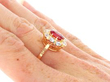 18ct Gold Ruby and Diamond Cluster Ring on hand