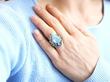Carved Aquamarine and Diamond Stylised Insect Ring being worn