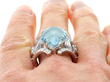 Carved Aquamarine and Diamond Stylised Insect Ring on finger