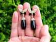 Vintage Black Onyx Earrings in Gold outside