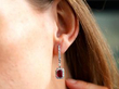 wearing Ruby and Diamond Platinum Drop Earring