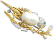 Blister Pearl Bird Brooch in Gold with diamonds and emerald
