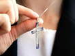 wearing Edwardian Sapphire and Diamond Cross Pendant