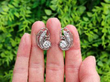 Antique Diamond Swirl Earrings in Platinum outside