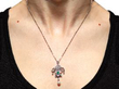wearing Pearl Diamond and Emerald Pendant Necklace